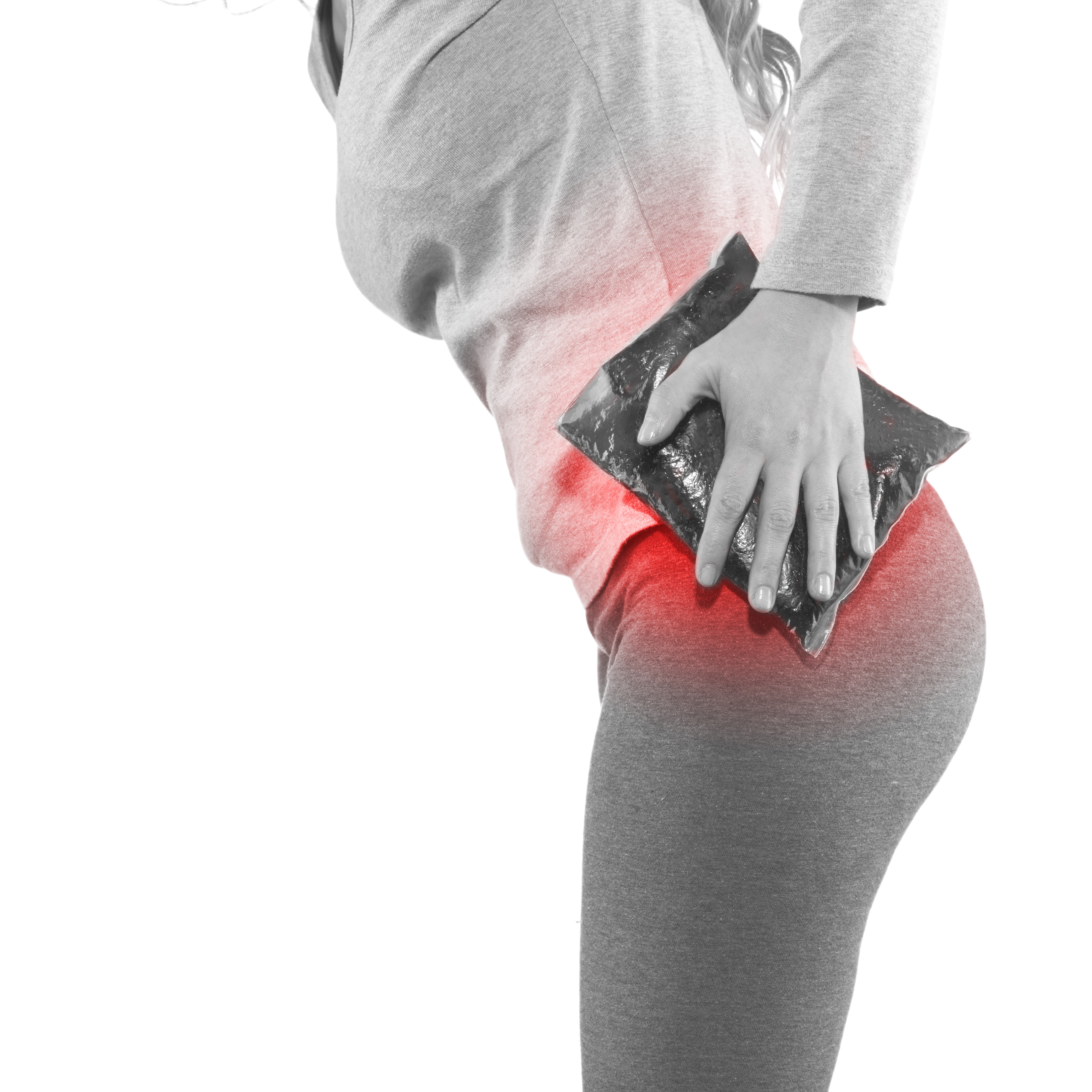 Cool gel pack on a swollen hurting hip. Medical concept photo.